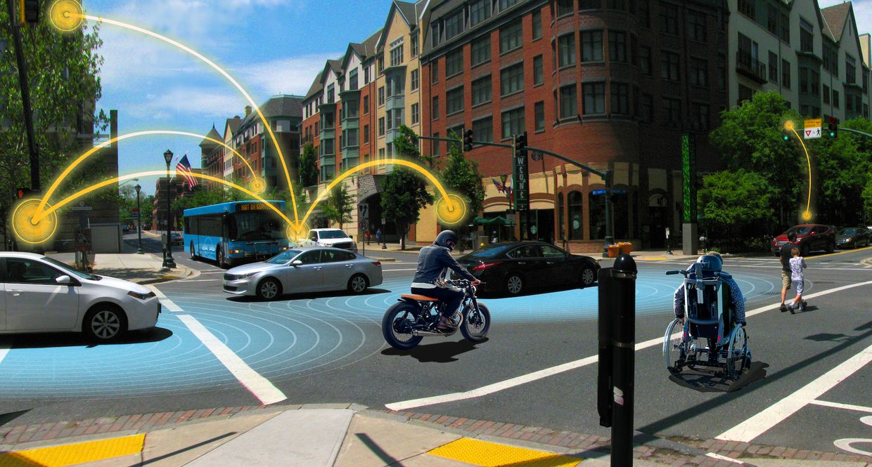 Vehicles and pedestrians at an intersection